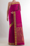 Pure Silk Pure Zari Dark Pink Kanjivaram Saree with Zari Butta on the body and Zari Border.  displayed on a mannequin