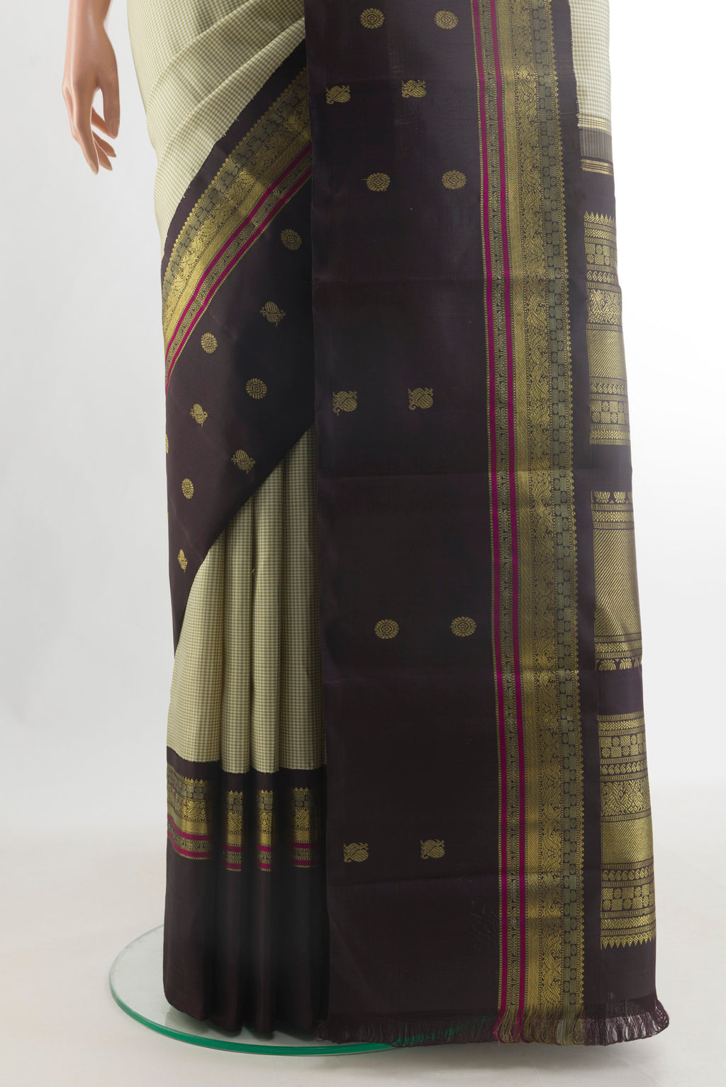 Pleats and pallu of Pure Silk Pure Zari Sage Green Kanjivaram Saree with Checked design on the body and Zari Border. 