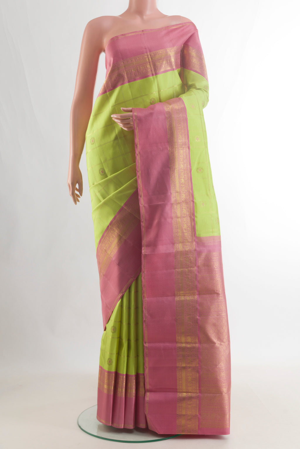 Pure Silk Pure Zari Lemon Yellow Kanjivaram Saree with Checked design on the body and Zari Border.  displayed on a mannequin
