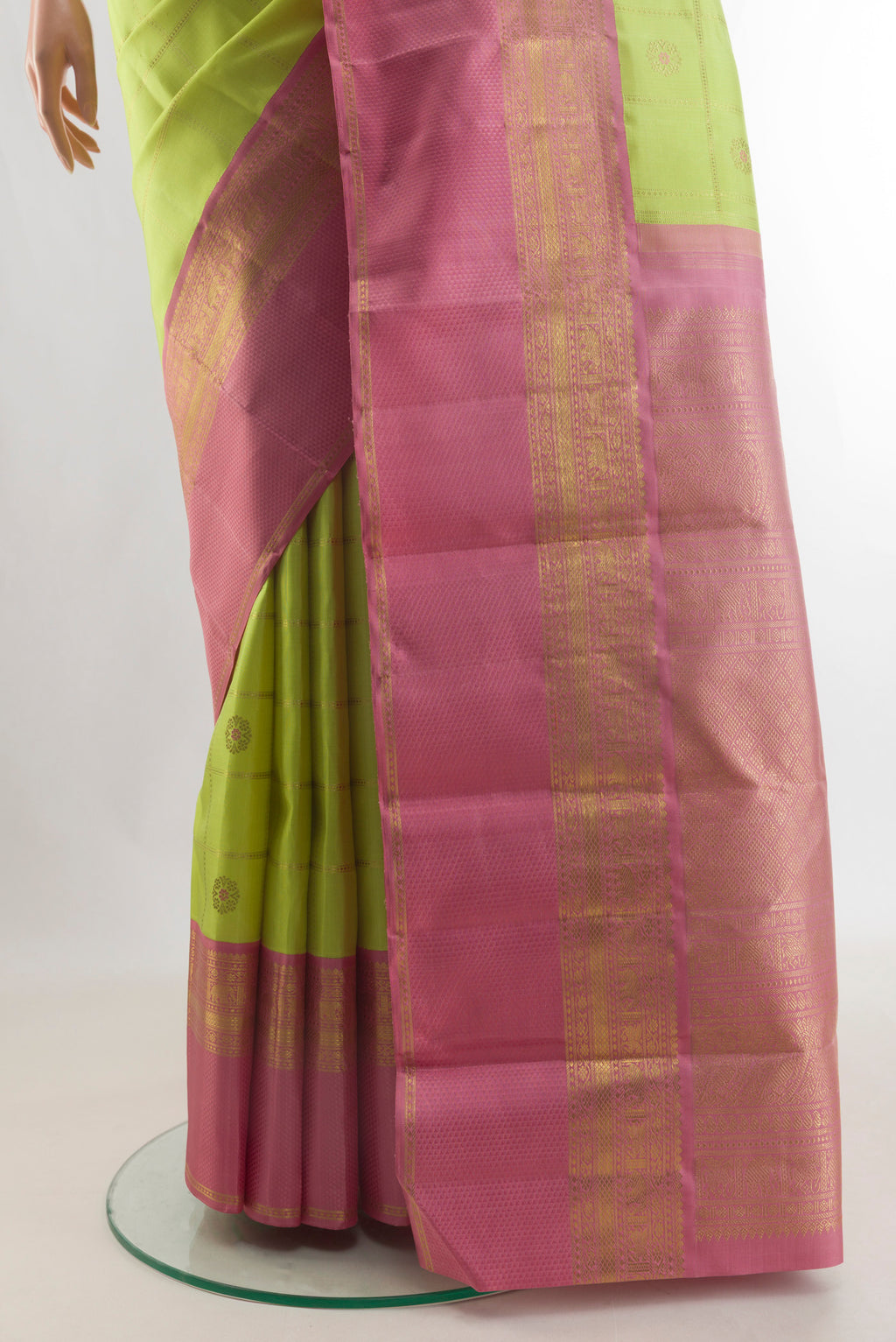 Pleats and pallu of Pure Silk Pure Zari Lemon Yellow Kanjivaram Saree with Checked design on the body and Zari Border. 