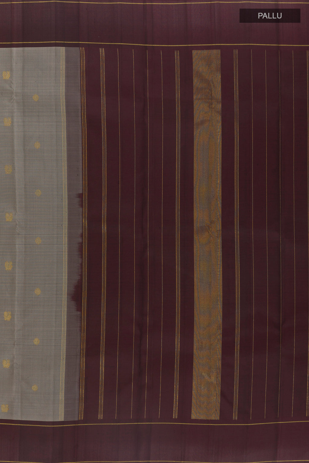 Close up image of the pallu of Pure Silk Pure Zari Grey Kanjivaram Saree with Zari Butta on the body and Plain Border. 