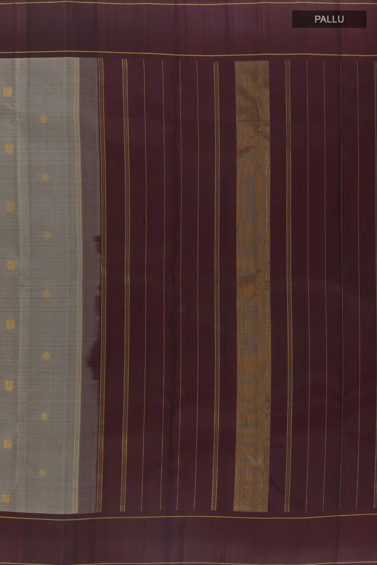 Close up image of the pallu of Pure Silk Pure Zari Grey Kanjivaram Saree with Zari Butta on the body and Plain Border. 