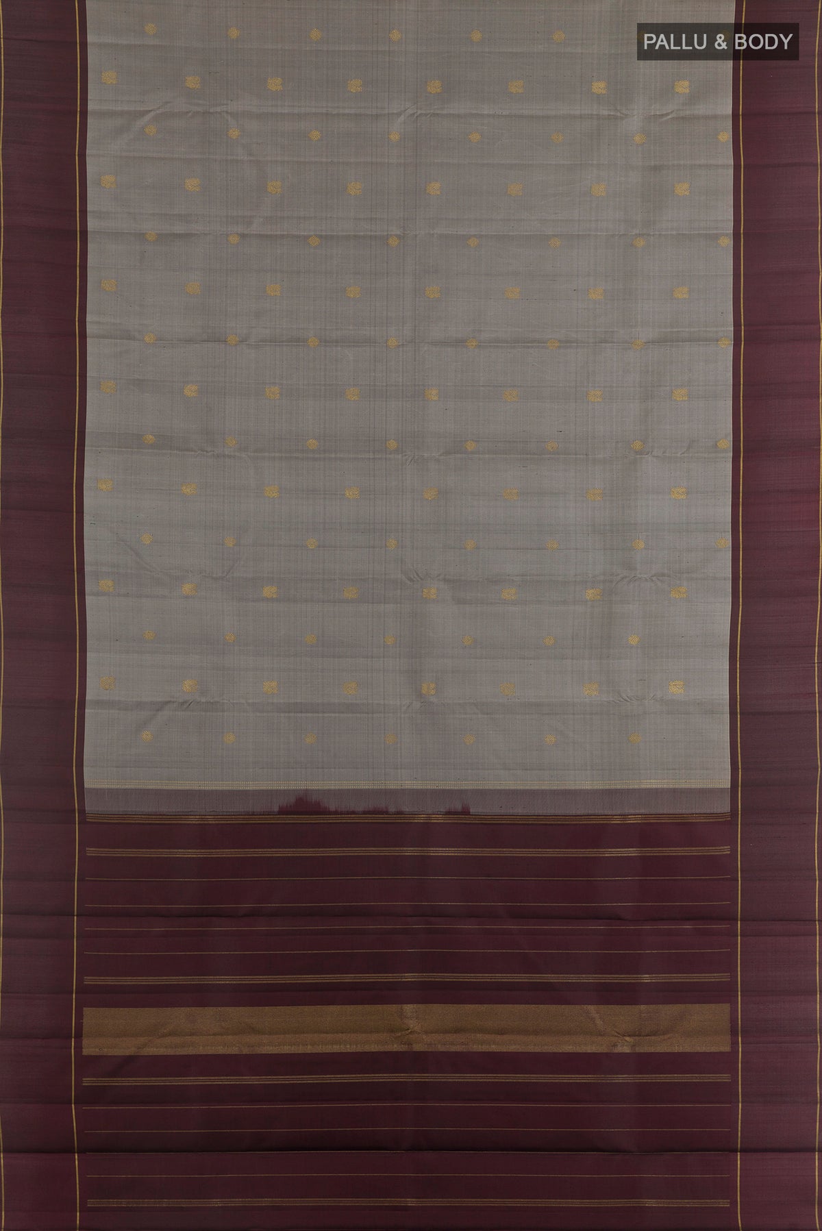 Flat view of Pure Silk Pure Zari Grey Kanjivaram Saree with Zari Butta on the body and Plain Border. 