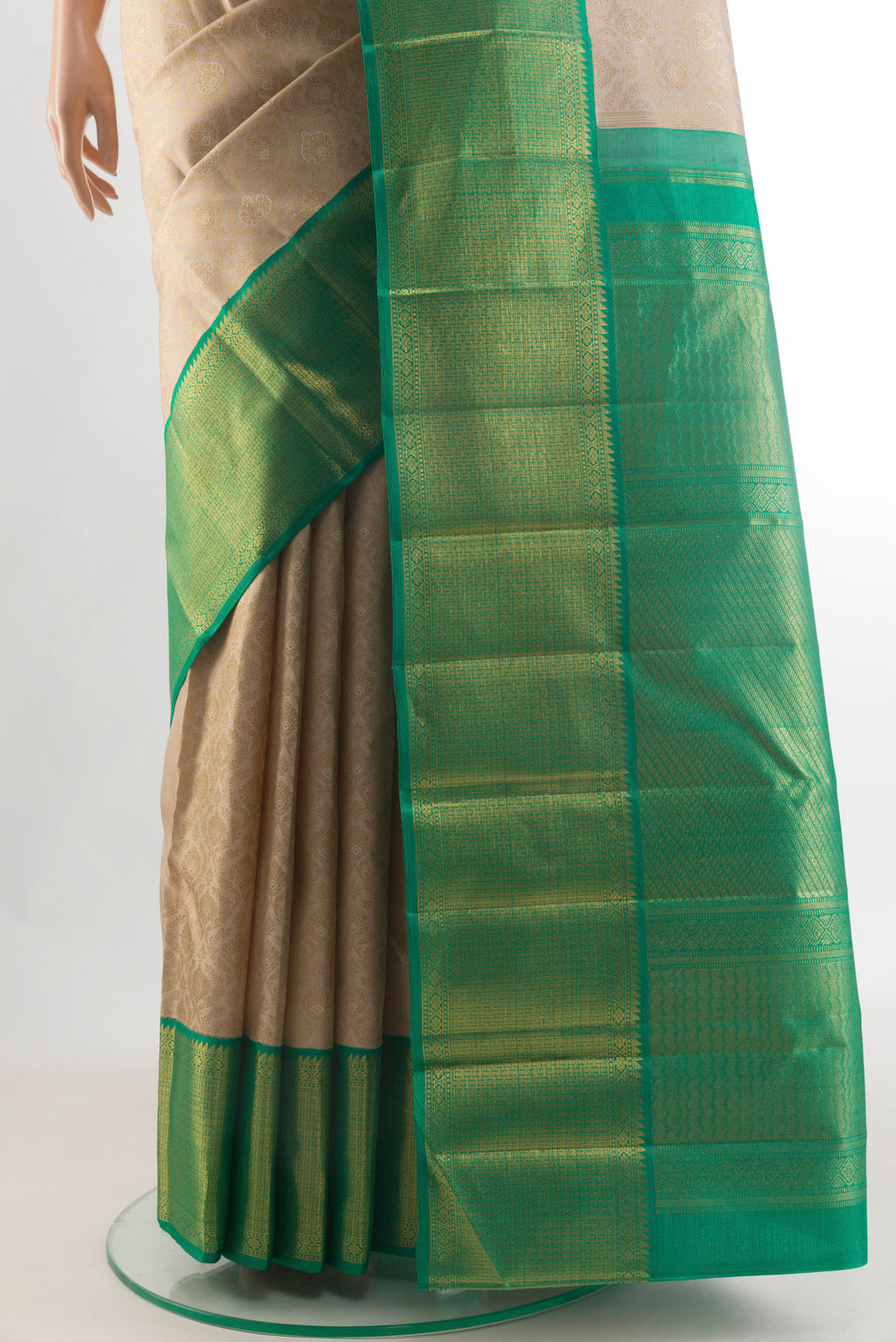 Pleats and pallu of Pure Silk Pure Zari Beige Kanjivaram Saree with Zari Brocade on the body and Zari Border. 