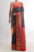 Pure Silk Pure Zari Navy Blue Kanjivaram Saree with Zari Brocade on the body and Zari Border.  displayed on a mannequin
