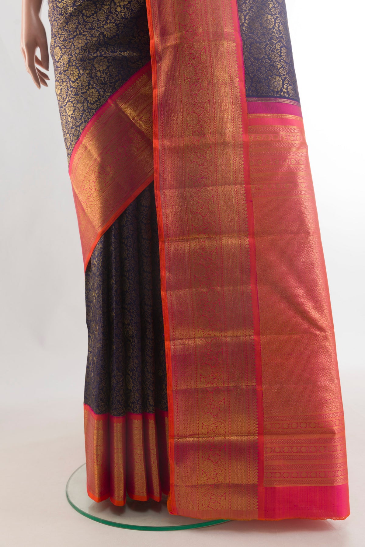 Pleats and pallu of Pure Silk Pure Zari Navy Blue Kanjivaram Saree with Zari Brocade on the body and Zari Border. 