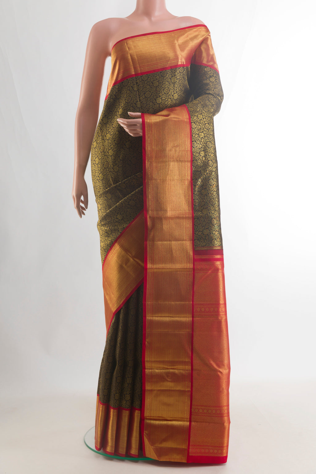 Pure Silk Pure Zari Black Kanjivaram Saree with Zari Brocade on the body and Zari Border.  displayed on a mannequin