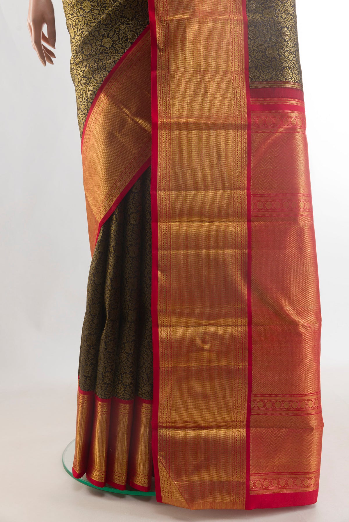 Pleats and pallu of Pure Silk Pure Zari Black Kanjivaram Saree with Zari Brocade on the body and Zari Border. 