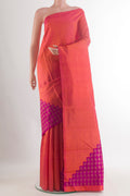 Pure Silk Pure Zari Brick Orange Kanchipuram Saree with Plain Body and Without Border.  displayed on a mannequin