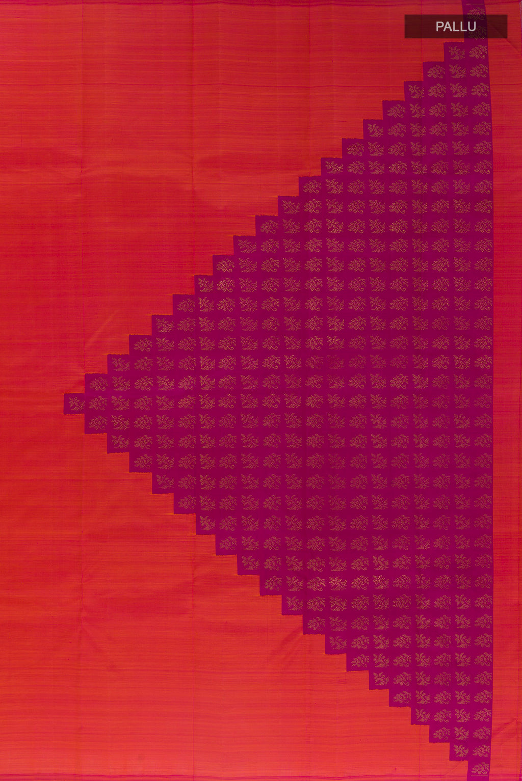 Close up image of the pallu of Pure Silk Pure Zari Brick Orange Kanchipuram Saree with Plain Body and Without Border. 