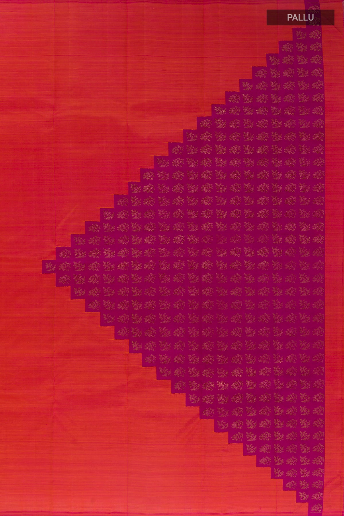 Close up image of the pallu of Pure Silk Pure Zari Brick Orange Kanchipuram Saree with Plain Body and Without Border. 