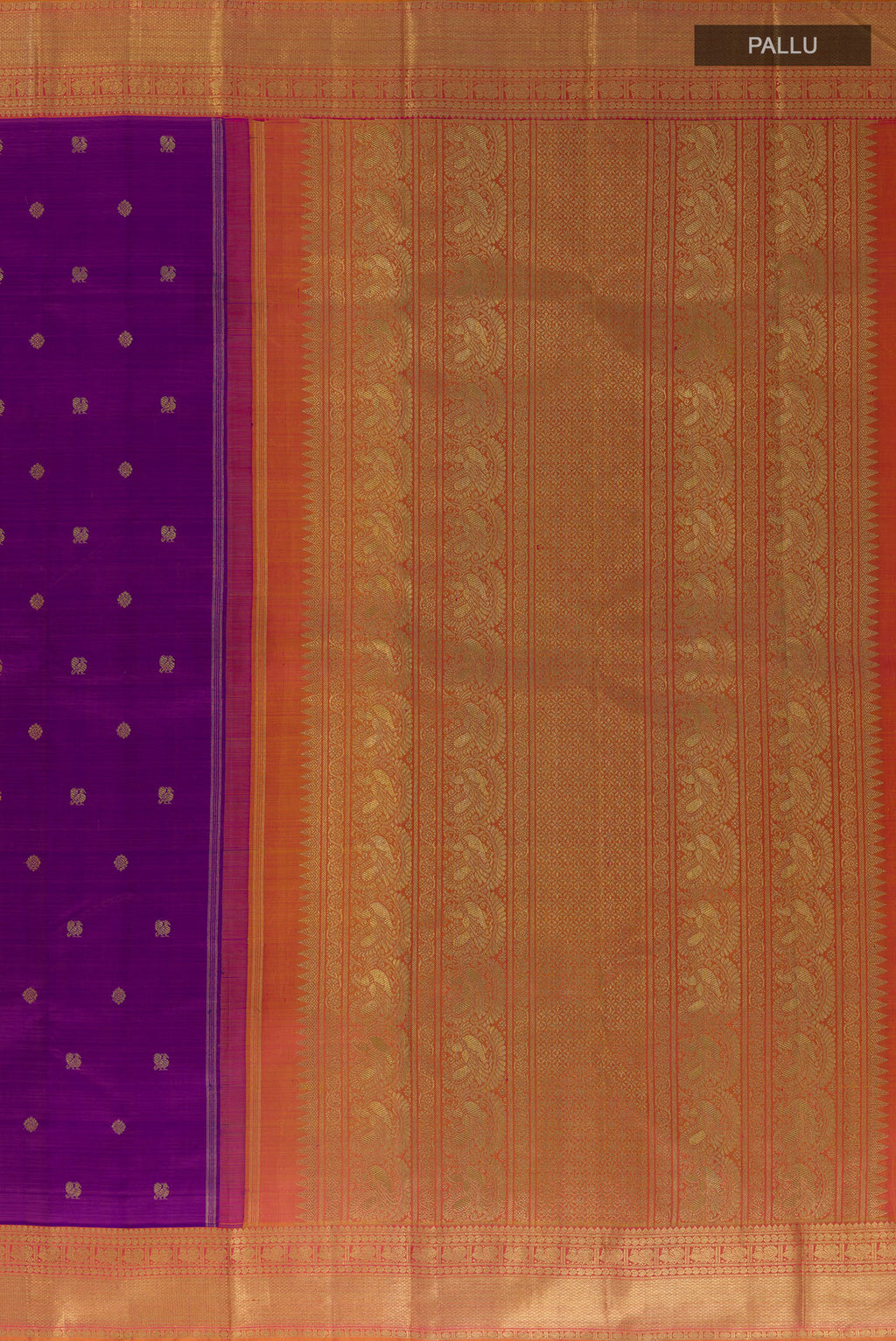 Close up image of the pallu of Pure Silk Pure Zari Purple Kanjivaram Saree with Zari Butta on the body and Zari Border. 