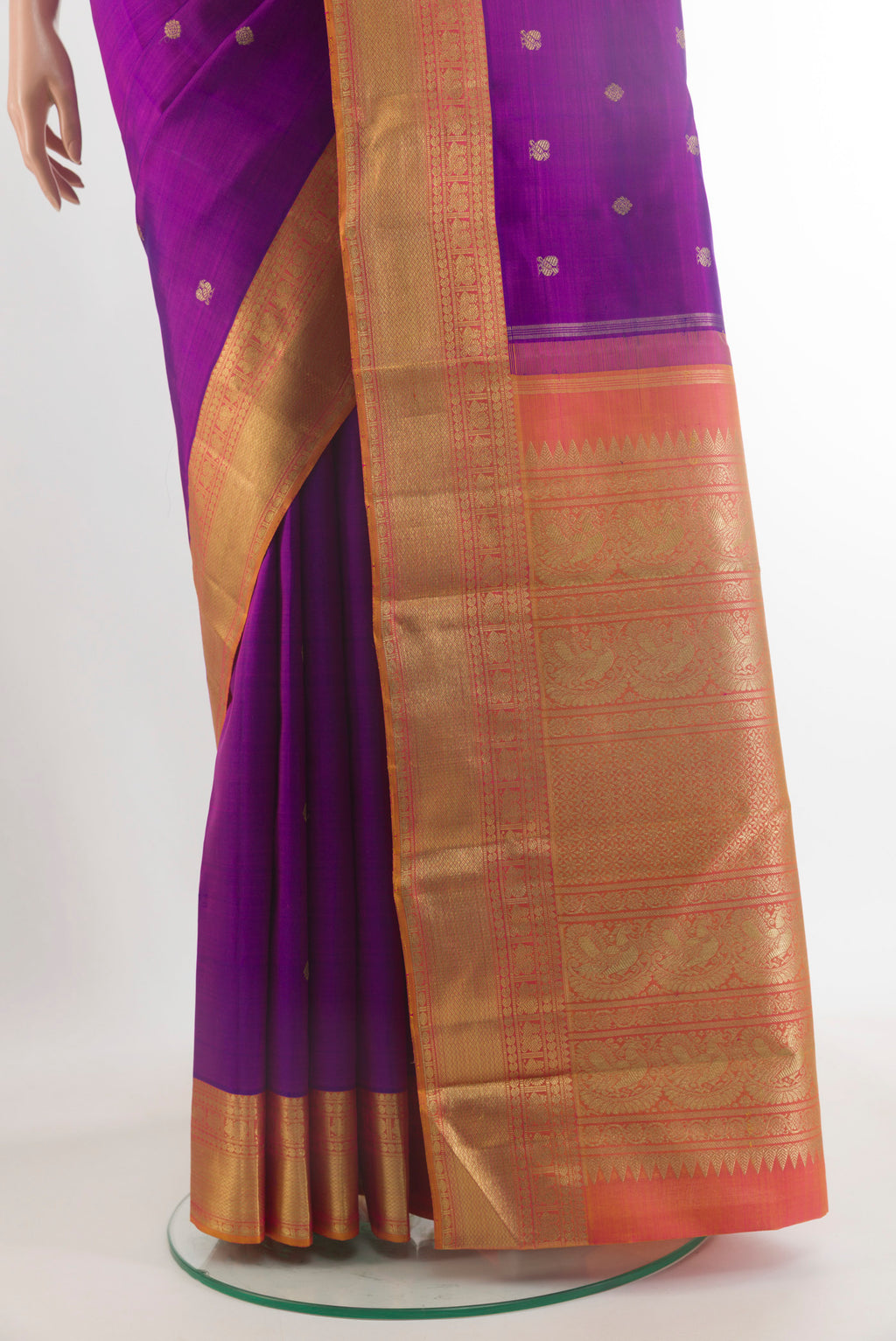Pleats and pallu of Pure Silk Pure Zari Purple Kanjivaram Saree with Zari Butta on the body and Zari Border. 