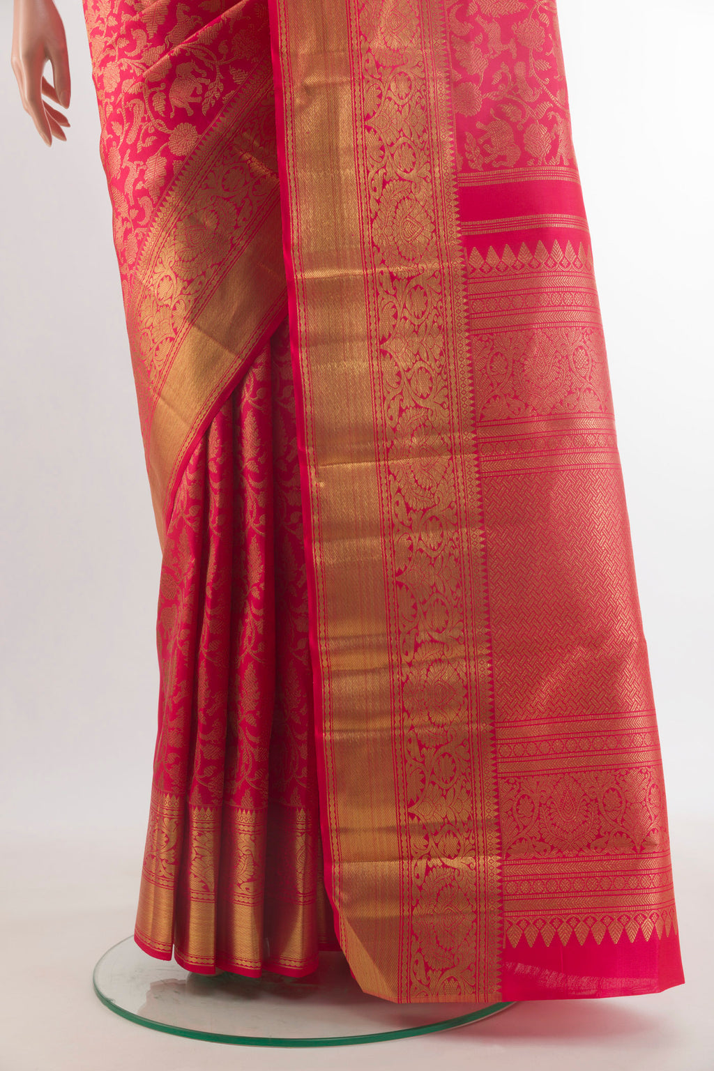 Pleats and pallu of Pure Silk Pure Zari Dark Pink Kanjivaram Saree with Zari Brocade on the body and Zari Border. 