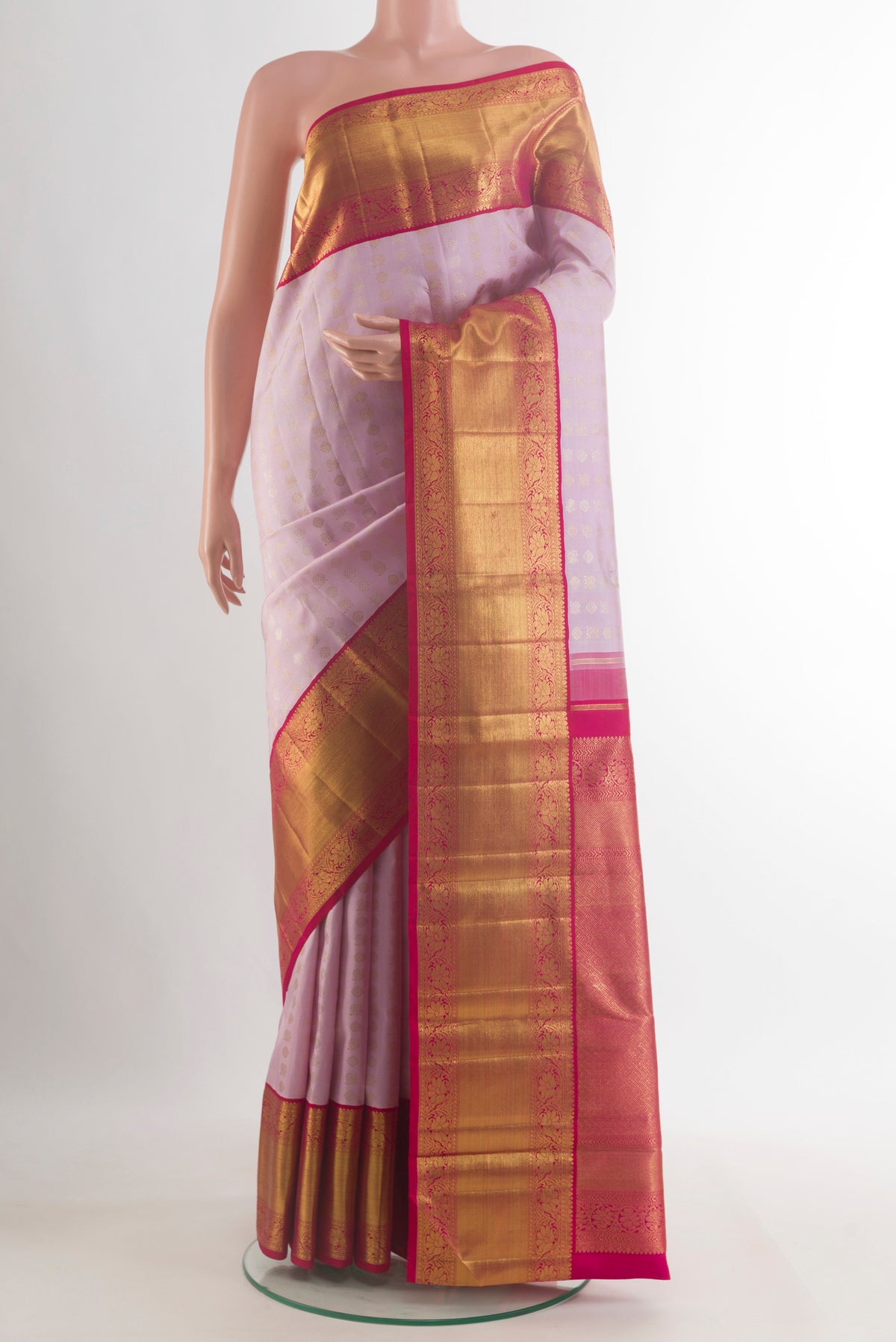Pure Silk Pure Zari Rose pink Kanchipuram Saree with Zari Butta on the body and Zari Border.  displayed on a mannequin