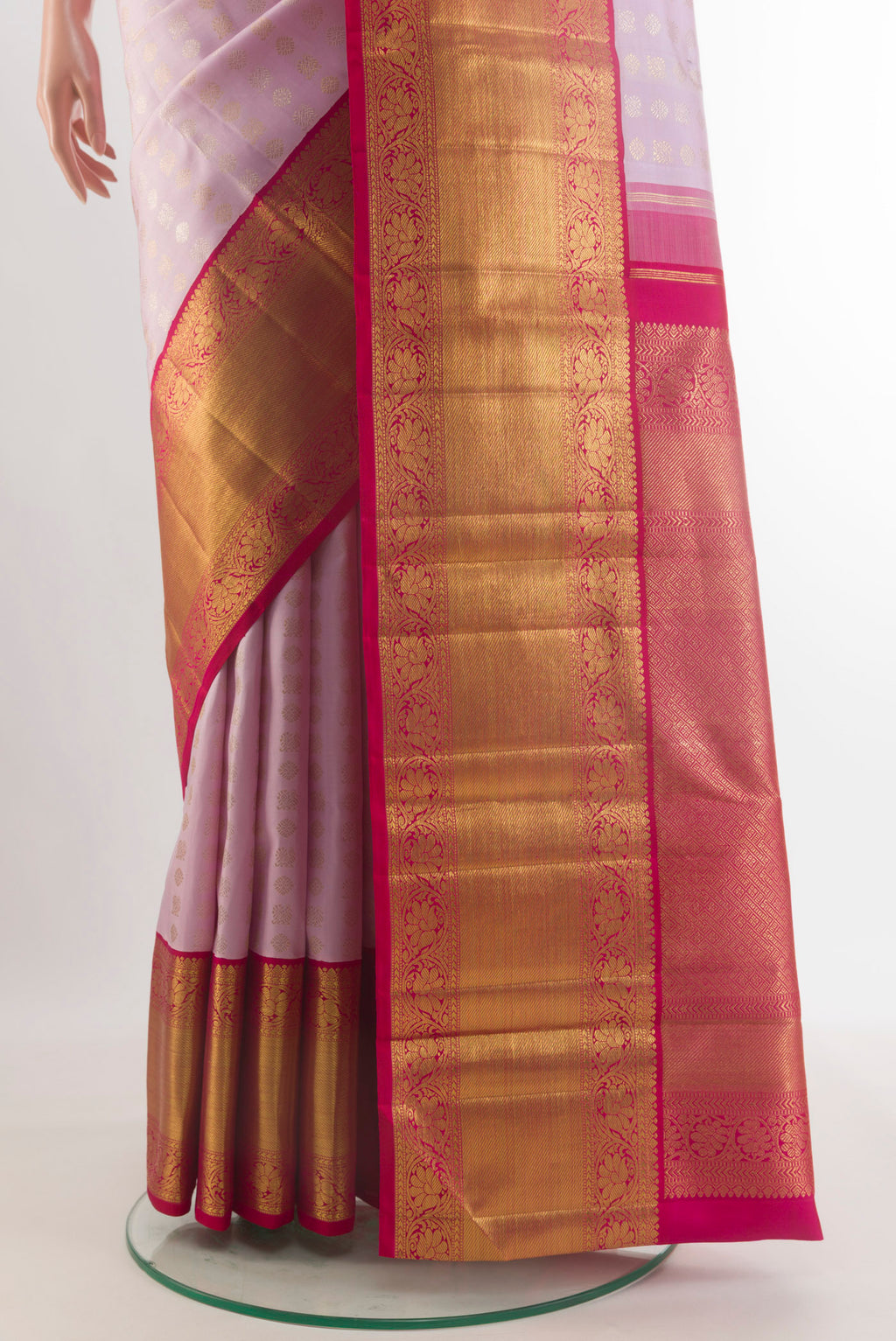 Pleats and pallu of Pure Silk Pure Zari Rose pink Kanchipuram Saree with Zari Butta on the body and Zari Border. 