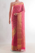 Pure Silk Pure Zari Pink Kanjivaram Saree with Zari Brocade on the body and Zari Border.  displayed on a mannequin