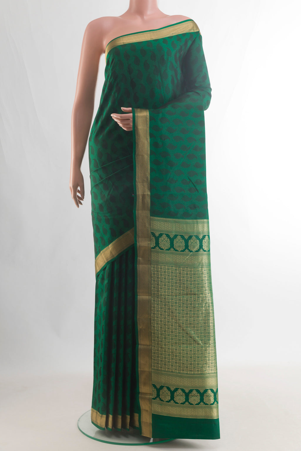 Pure Silk Green Kanchipuram Saree with Jacquard design on the body and Zari Border.  displayed on a mannequin