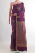 Pure Silk Purple Kanchipuram Saree with Zari Butta on the body and Zari Border.  displayed on a mannequin