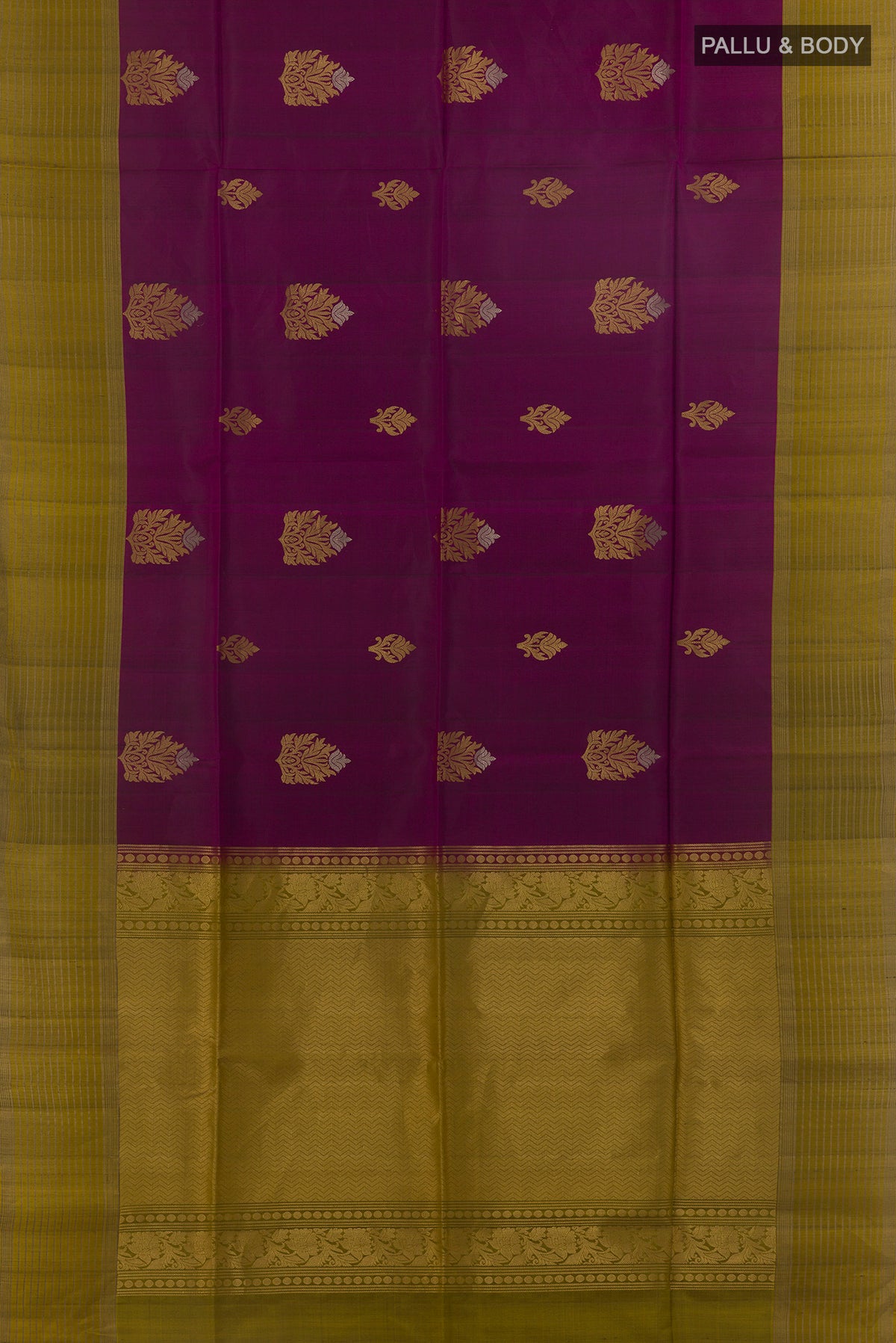 Flat view of Pure Silk Purple Soft Saree with Zari Butta on the body and Zari Border. 