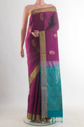 Pure Silk Purple Soft Saree with Zari Butta on the body and Zari Border.  displayed on a mannequin