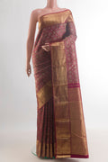 Pure Silk Maroon Kanjivaram Saree with Zari Brocade on the body and Zari Border.  displayed on a mannequin