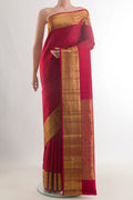 Pure Silk Red Kanjivaram Saree with Checked design on the body and Zari Border.  displayed on a mannequin