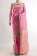 Pure Silk Pink Kanjivaram Saree with Jacquard design on the body and Zari Border.  displayed on a mannequin