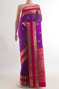Pure Silk Purple Kanchipuram Saree with Zari Butta on the body and Zari Border.  displayed on a mannequin