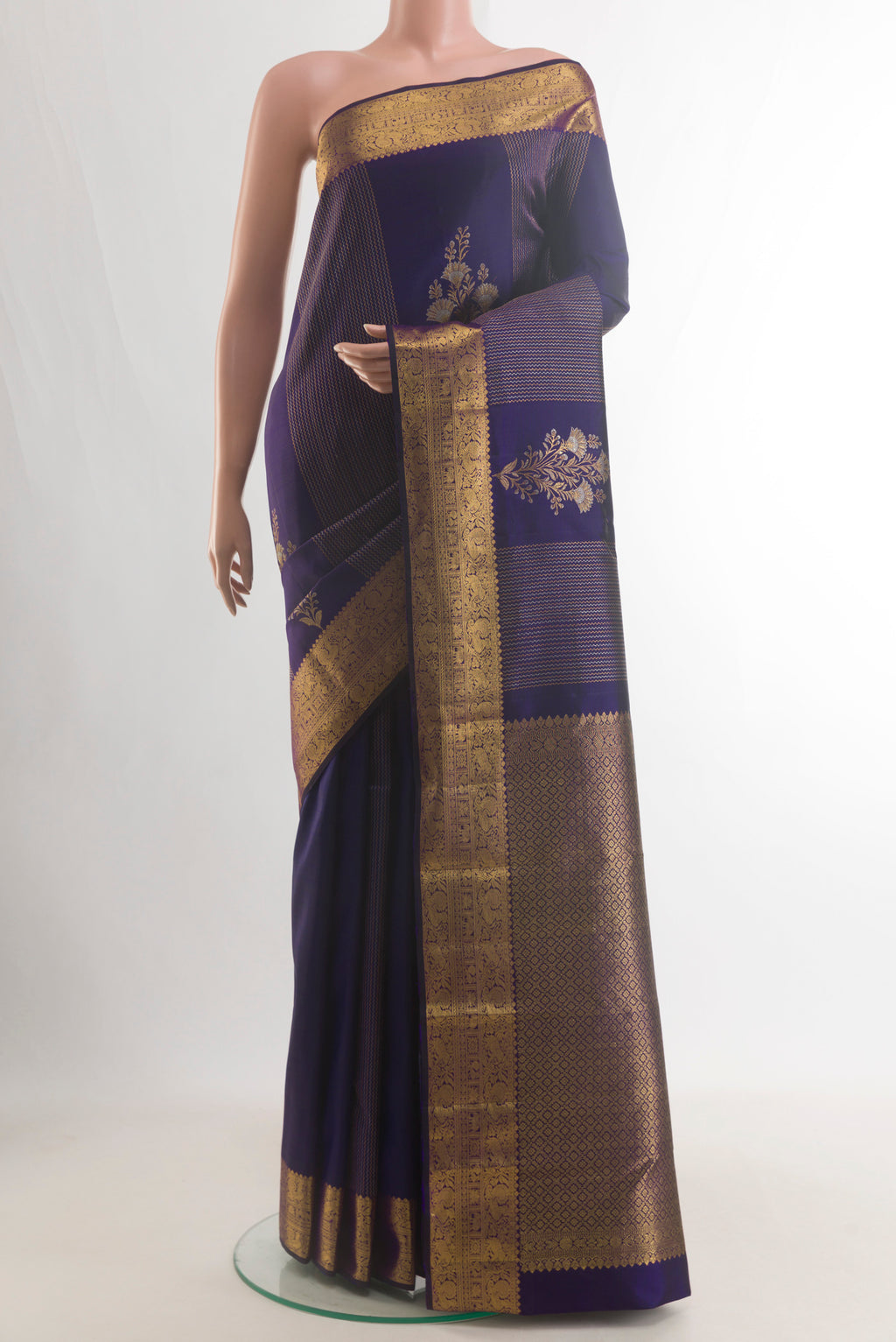 Pure Silk Navy Blue Kanjivaram Saree with Stripes on the body and Zari Border.  displayed on a mannequin
