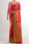 Pure Silk Orange Kanjivaram Saree with Zari Butta on the body and Paithani Border.  displayed on a mannequin