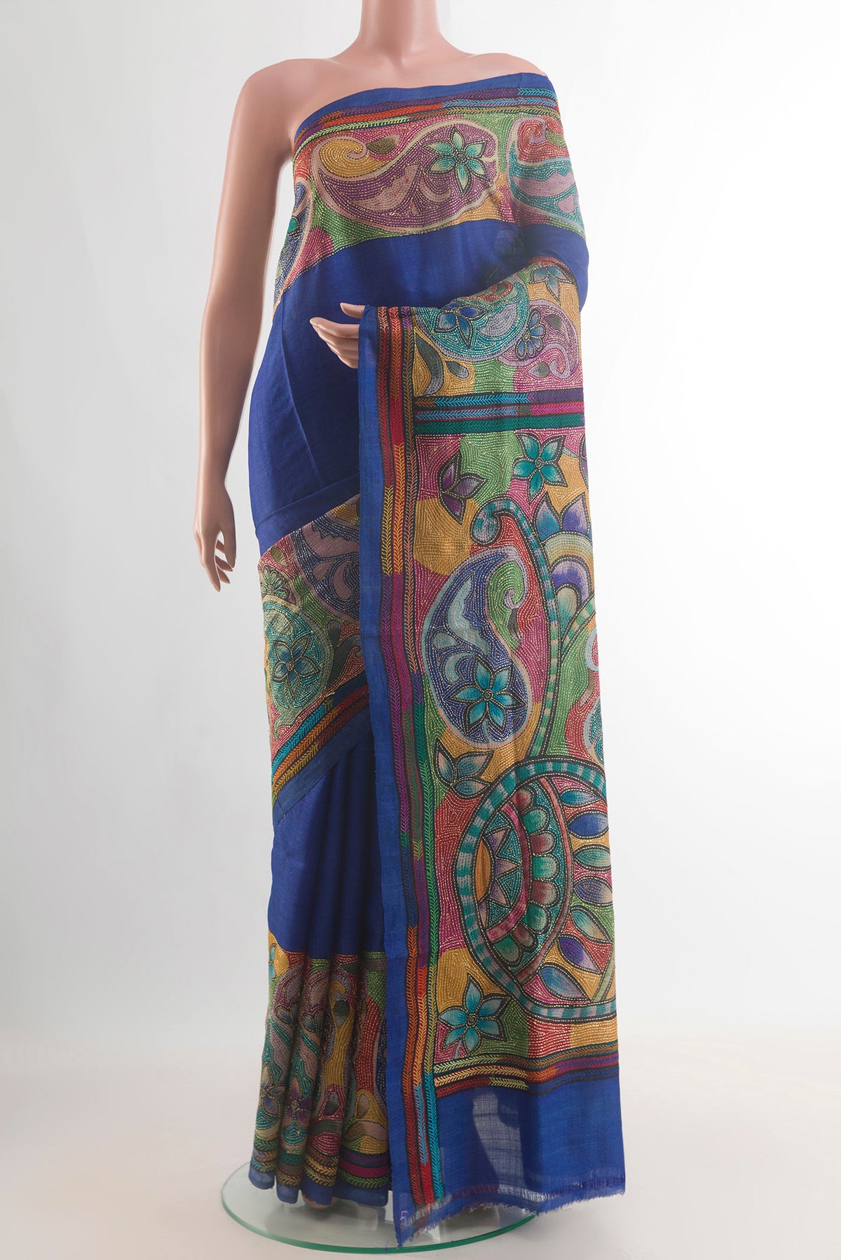 Royal Blue Tussar Saree with Kantha Work on the body and Embroidery Border.  displayed on a mannequin