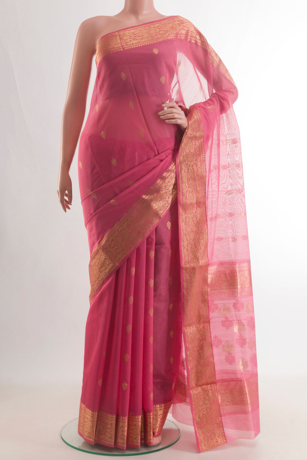 Coral Blended Chanderi Silk Cotton Saree with Zari Butta on the body and Zari Border.  displayed on a mannequin