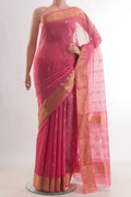 Coral Blended Chanderi Silk Cotton Saree with Zari Butta on the body and Zari Border.  displayed on a mannequin