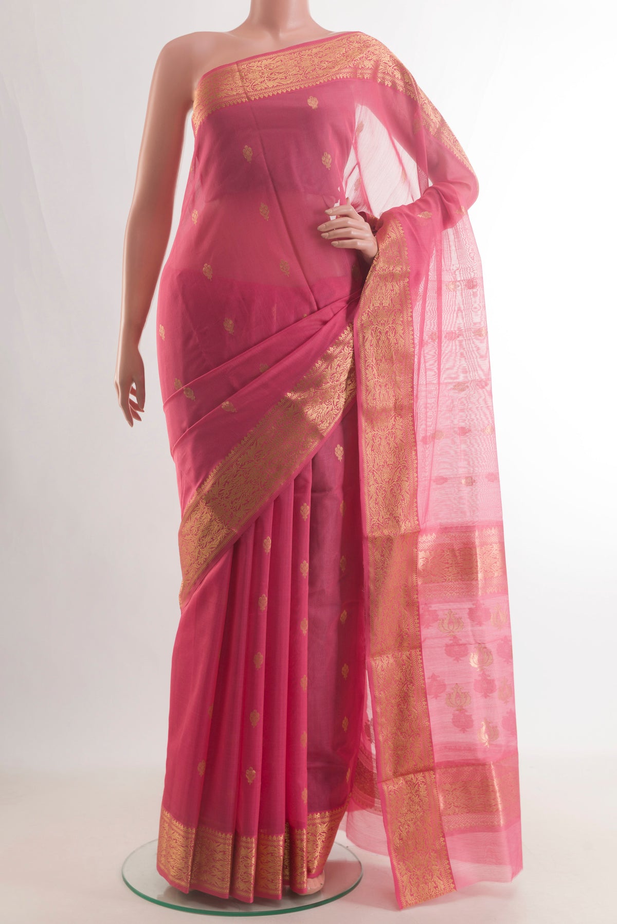 Coral Blended Chanderi Silk Cotton Saree with Zari Butta on the body and Zari Border.  displayed on a mannequin