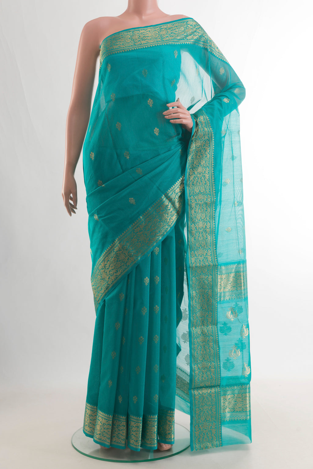 Turquoise Chanderi Cotton Saree with Zari Butta on the body and Zari Border.  displayed on a mannequin