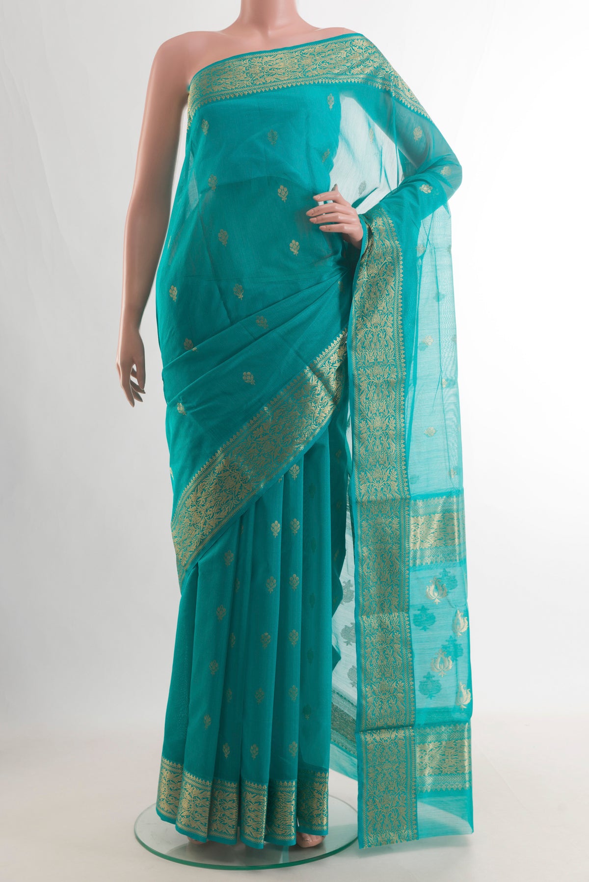 Turquoise Chanderi Cotton Saree with Zari Butta on the body and Zari Border.  displayed on a mannequin