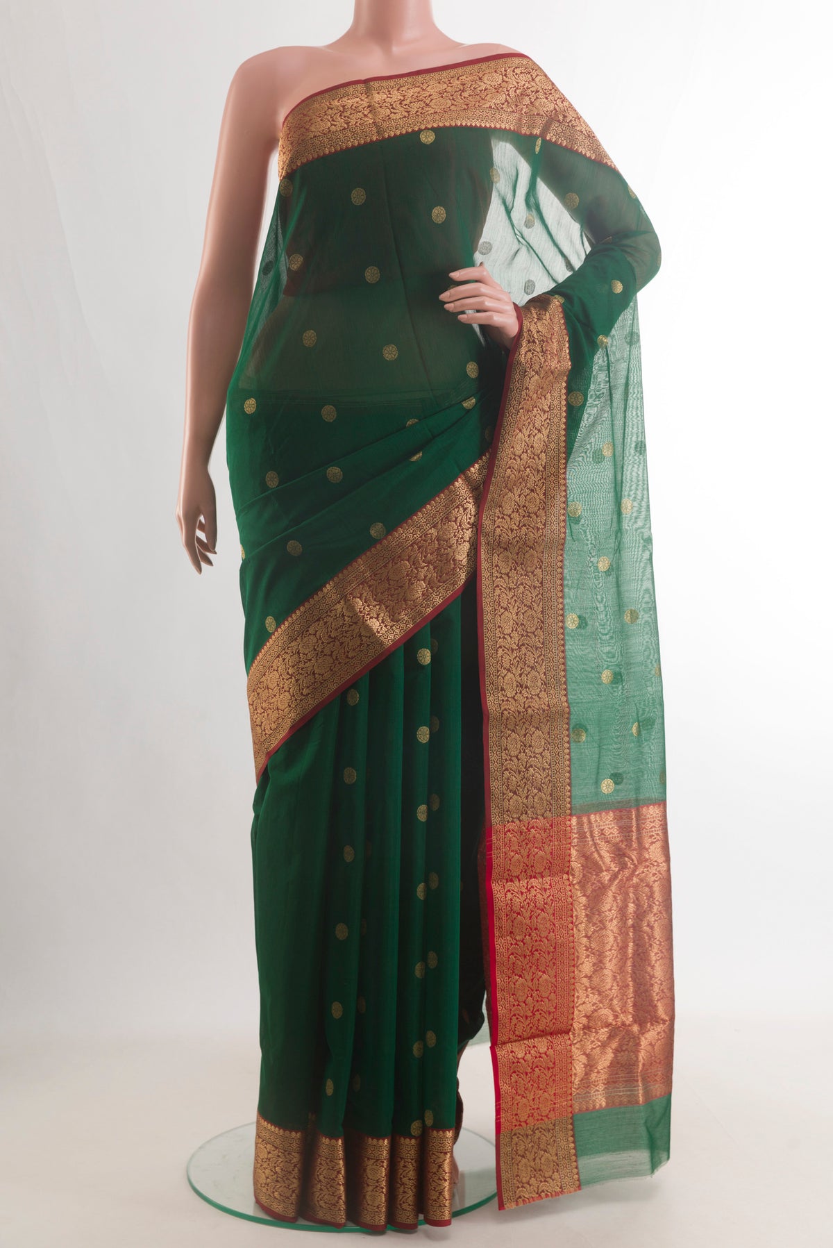 Green Chanderi Cotton Saree with Zari Butta on the body and Zari Border.  displayed on a mannequin