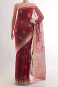 Maroon Chanderi Cotton Saree with Zari Butta on the body and Zari Border.  displayed on a mannequin