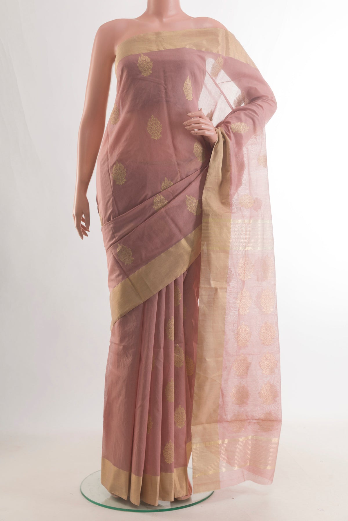 Rose Gold Chanderi Cotton Saree with Zari Butta on the body and Zari Border.  displayed on a mannequin