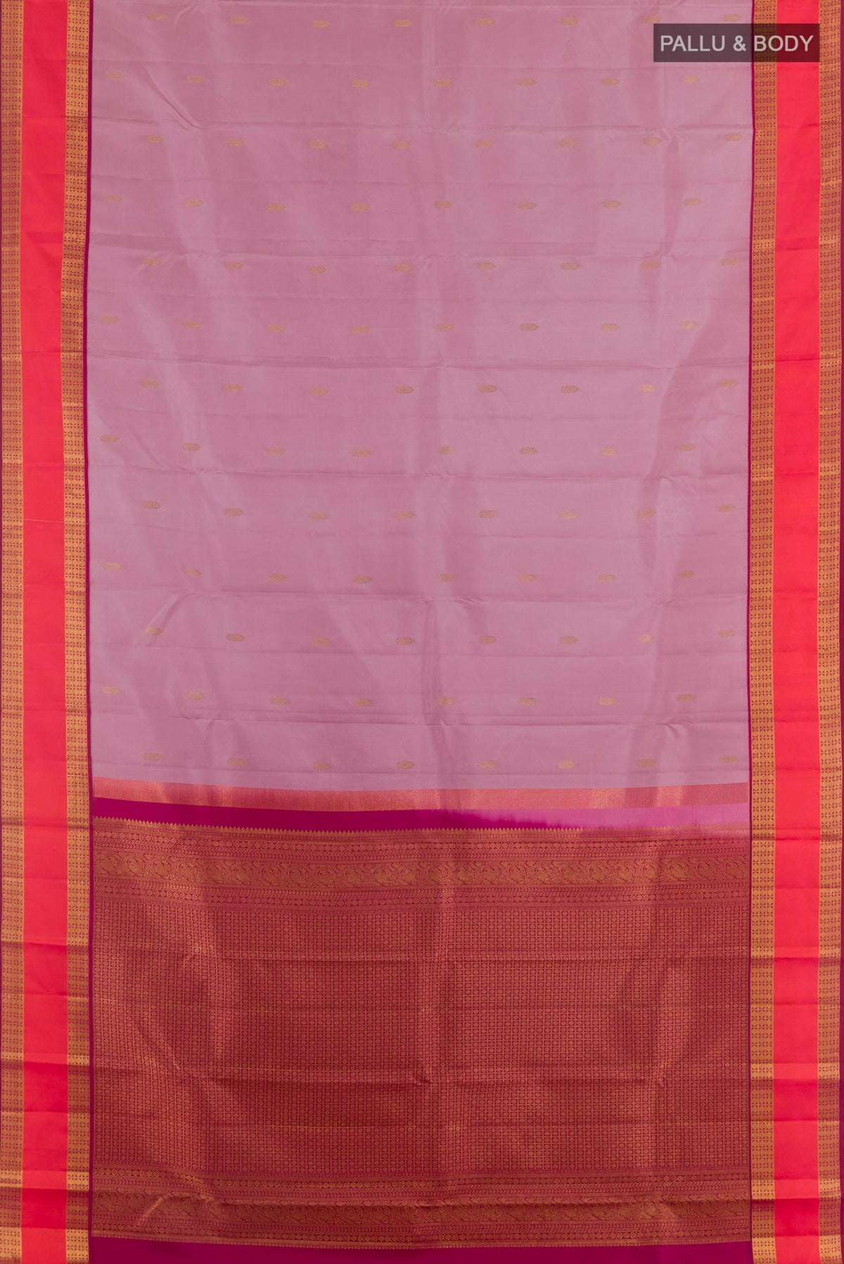 Flat view of Pure Silk Rose Gold Kanchipuram Saree with Zari Butta on the body and Zari Border. 