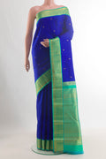 Pure Silk Royal Blue Kanchipuram Saree with Zari Butta on the body and Zari Border.  displayed on a mannequin