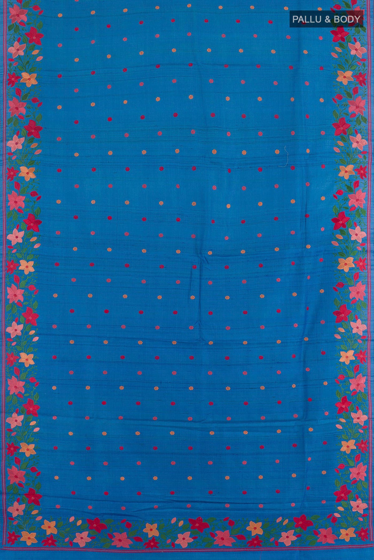 Flat view of Blue Tussar Saree with Embroidery on the body and Embroidery Border. 