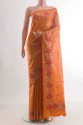 Orange Tussar Saree with Embroidery on the body and Embroidery Border.  displayed on a mannequin