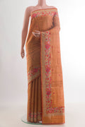 Mustard Tussar Saree with Embroidery on the body and Embroidery Border.  displayed on a mannequin