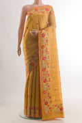 Yellow Tussar Saree with Embroidery on the body and Embroidery Border.  displayed on a mannequin