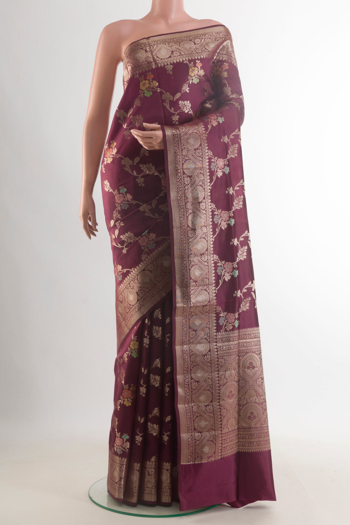 Pure Silk Coffee Brown Banarasi Raw Saree with Zari Brocade on the body and Zari Border.  displayed on a mannequin