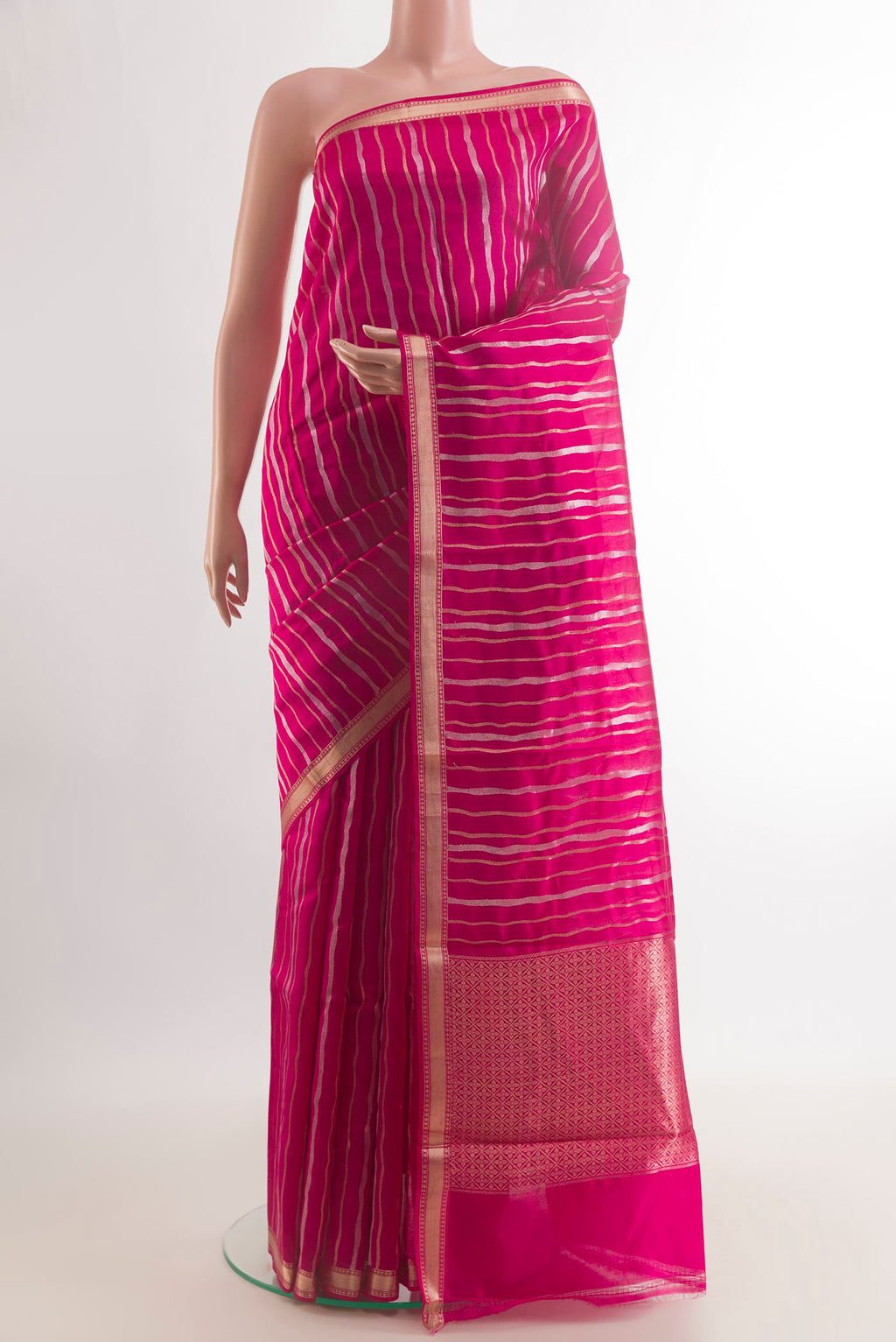 Pure Silk Pink Banarasi Katan Saree with Stripes on the body and Zari Border.  displayed on a mannequin