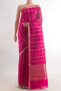 Pure Silk Pink Banarasi Katan Saree with Stripes on the body and Zari Border.  displayed on a mannequin