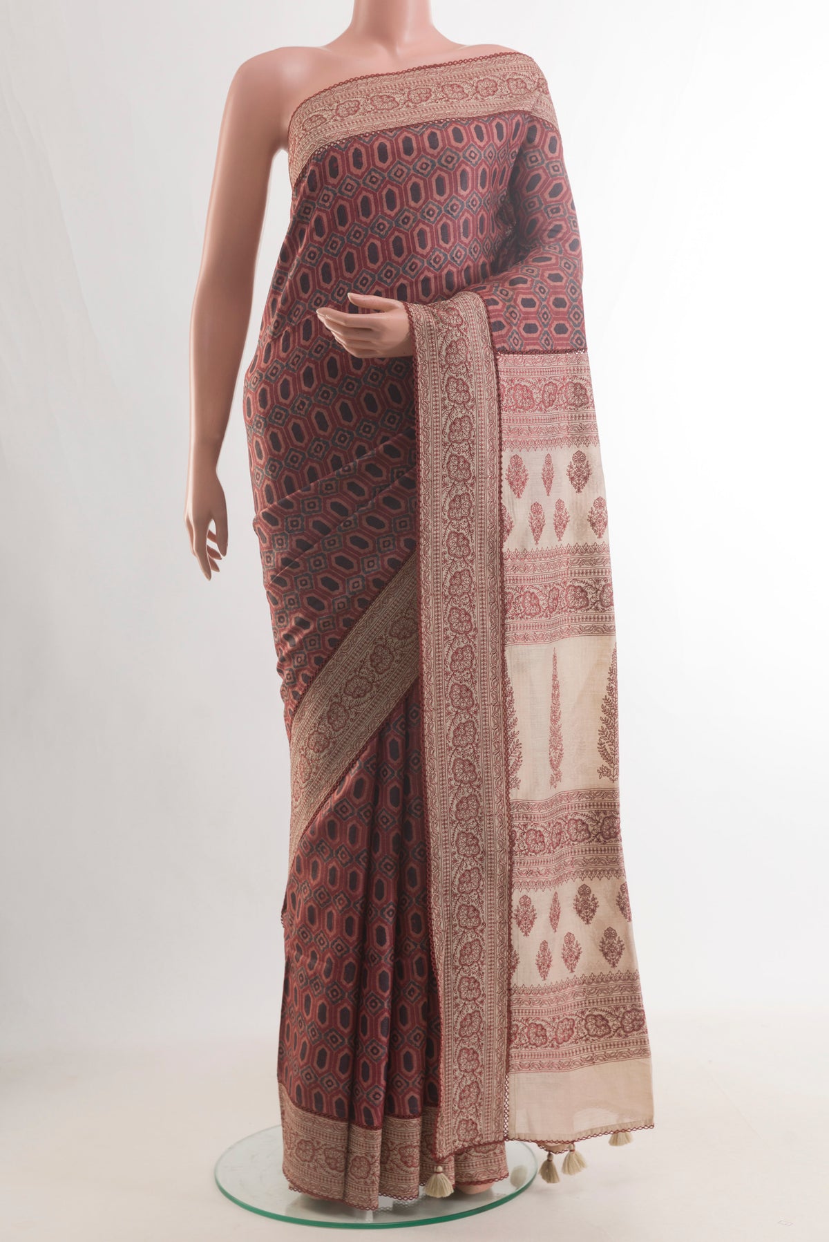 Multi Color Tussar Saree with Printed design on the body and Embroidery Border.  displayed on a mannequin